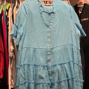 This is a light and breezy short sleeve button top